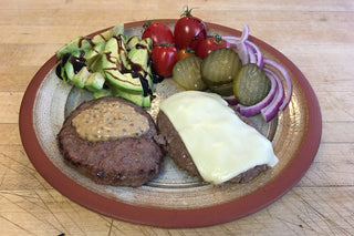 Delicious Buffalo Burgers (96% lean) ready to eat with vegetables.