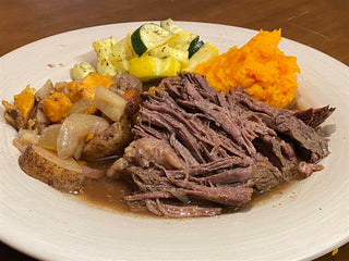 Buffalo Roast with sweet potatoes and vegetables. 