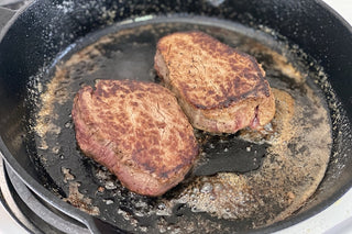 Buffalo Tenderloin Steaks in the frying pan.