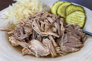 Pastured Pork Butt with slaw and pickles.
